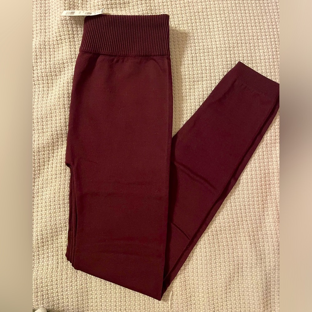 NWT Deep Wine/Oxblood colored Fleece lined leggings.